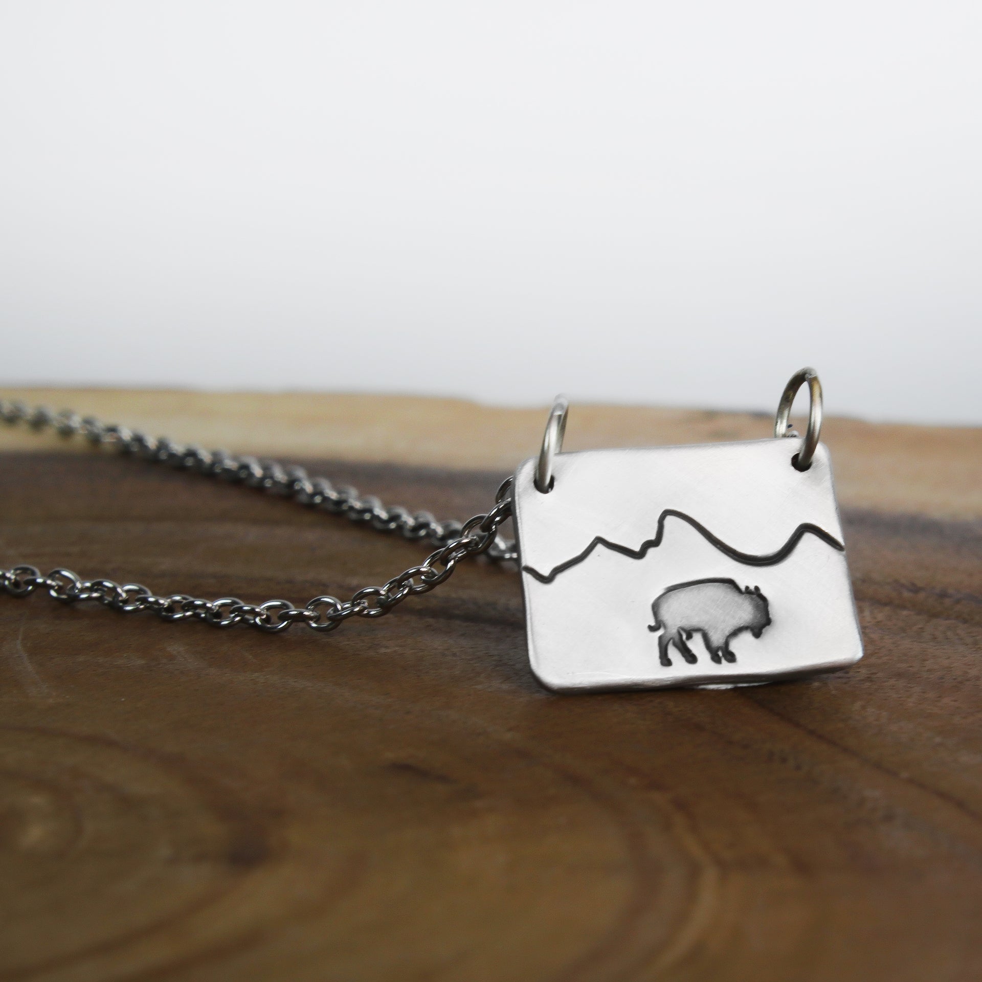 Bison Mountain Necklace on Wood